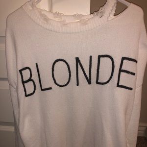 White sweater with phrase “BLONDE”
